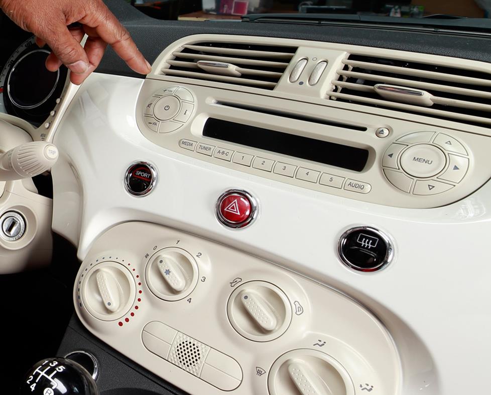 The Fiat's factory radio and dash console